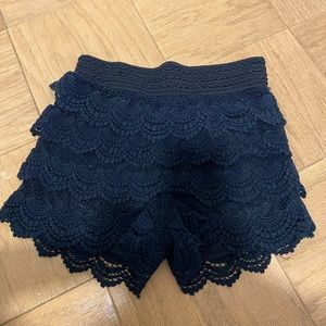 Cute skort from Forever 21 size XS, ruffled and black.